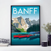 Travel poster of Banff National Park in Canada with view of lake, mountain and canoes